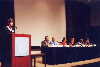 Sarah Strunk introduces the afternoon panel; (left to right): A. Dennis McBride. MD, MPH; Joel Schwartz, PhD; Marian Johnson-Thompson, PhD;Jacqueline Resnick; Bill Jenkins, MPH, PhD; Janet Southerland, DDS,MPH, PhD